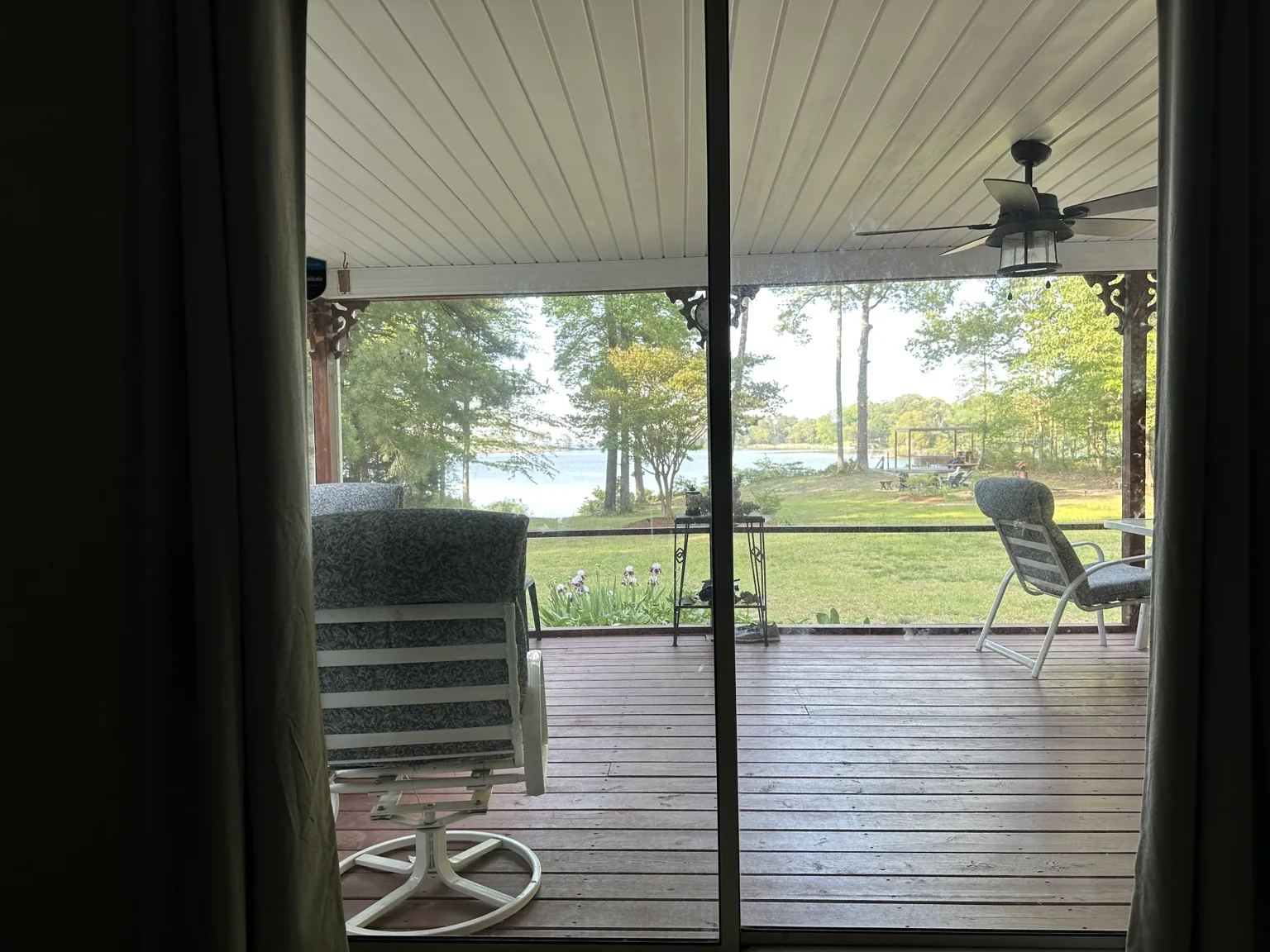 View from inside Vista Cove through the porch toward the water
